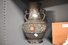 A modern Chinese cast bronze vase or converted lamp base in archaic form with cloisonne enamel