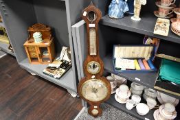 An antique L. Balerna Halifax banjo barometer with a Rosewood case, missing top glass.