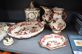 A selection of Masons Mandalay Red pattern ceramics including a clock, vase, water jug and bowls.