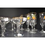 Two sets of mid century advertising cocktail glasses for Babycham and Britvic