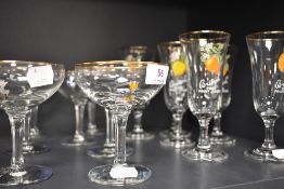 Two sets of mid century advertising cocktail glasses for Babycham and Britvic