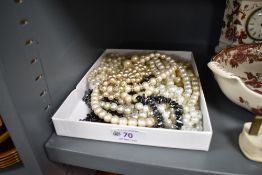 A collection of Beaded pearl effect necklaces and a stone necklace.
