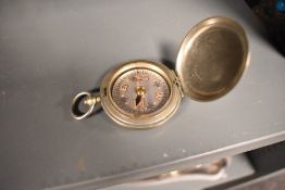 An early 20th century Dennison 1918 military compass.