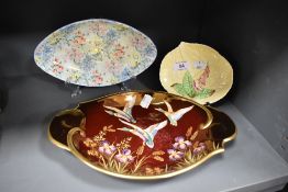 Three early 20th century bowls including Carlton Ware Rouge with hand painted mallard duck design,
