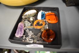 A collection of Studio art glass, enamel and mineral necklaces and pendants.
