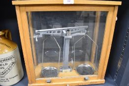 An early 20th century Phillip Harris cased set of scientific scales