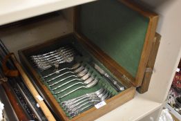 A vintage cased set of silver plated cutlery.