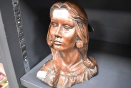 A modern resin cast bust of a Native American Squaw 20cm tall
