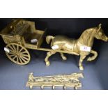 A vintage cast brass horse and cart figure with a similar key rack.