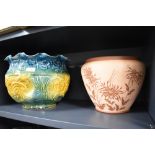Two Jardiniere planters including a large Victorian style pressed pot and a terracotta Salorian