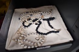 A small selection of modern cultured pearl jewellery including black pearl, pearl and blue agate