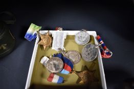 A small collection of military and coronation medals, none bearing owners names.