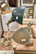 A Pair of unmatched Edwardian desktop mounted library lights, with adjustable brass arms on heavy