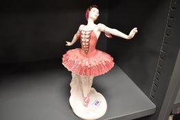 A Coalport Compton and Woodhouse figurine study The Firebird 'Royal Academy of Dancing 'Collection -