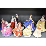 Nine modern Royal Doulton female figurines including Autumn Stroll HN4588, Welsh Beauty, First