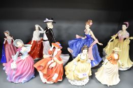 Nine modern Royal Doulton female figurines including Autumn Stroll HN4588, Welsh Beauty, First
