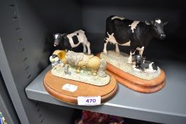 Two Border Fine Arts animal studies including Fresian Cow and Calf, Monty and a Thelwel figure.