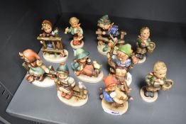 Ten Goebel Hummel small size figurines in vary poses and subjects.