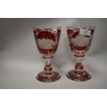 A pair of Victorian Bohemian ruby overlay glasses, having red high lights and highly detailed