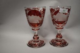 A pair of Victorian Bohemian ruby overlay glasses, having red high lights and highly detailed