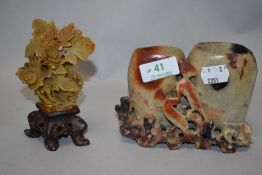 A Chinese carved soapstone bud vase having two compartments, sold with a Chinese soap stone carved