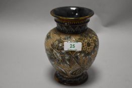 A Doulton Lambeth aysthetic period vase, circa 1880s, having textured sunflower design on beige