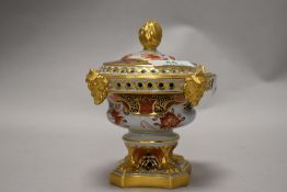 A 19th century Spode lidded Pot Pourri,in the Imari palette, having hand coloured floral sprigs,gilt