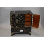 An early 20th century Chinese table top stationary box having internal rack and eight drawers,