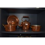 A selection of vintage copper ware, comprising charger with incised diamond design to edge, marked