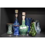 A collection of Wetheriggs/Schofield pottery, included are lamps and vases of varying form.