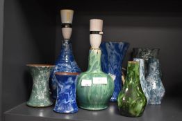 A collection of Wetheriggs/Schofield pottery, included are lamps and vases of varying form.
