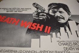 Two vintage movies posters, 'Midnight Express/ Taxi Driver' and 'death Wish II'.