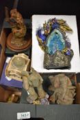 An assortment of figurines and animal studies, to include Lilliput lane 'Gold Top' with box, and '