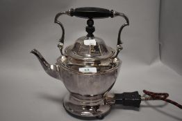 An early 20th century silver plated electric tea pot 'Universal' Landers, Friary and Clark.