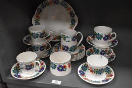 A selection of Elizebethan bone china 'Ascot' comprising; cups and saucers, plates and jug.