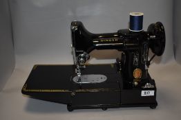 An extremely scarce Singer 222K Red S featherweight sewing machine with case, original instruction