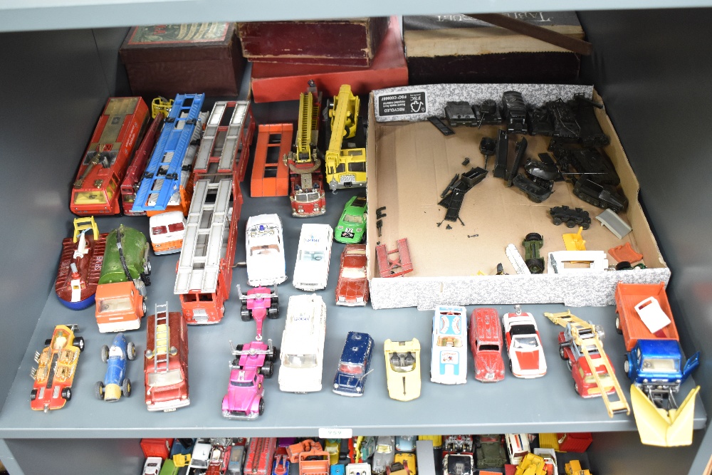 Two shelves of playworn diecasts including Dinky, Corgi, Matchbox etc