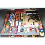 Two shelves of playworn diecasts including Dinky, Corgi, Matchbox etc