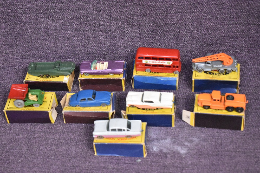 Nine Lesney Matchbox Series diecasts, 1960-1961 boxes, 2 Dumper, 5 London Routemaster Bus, 15