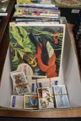 A box containing eighteen books of tea cards including some loose card part sets.