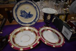 Four items of pottery including a Royal Doulton 'Norfolk' blue and white plate, two cabinet plates