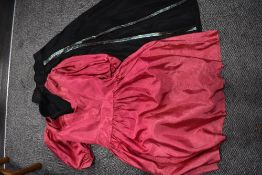 A vintage 1940s/50s evening skirt, having later had a seam opened to create a split and edged in