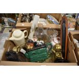 A box of assorted items including an Aga style green teapot, a brass savings bank Royal Mail Box,