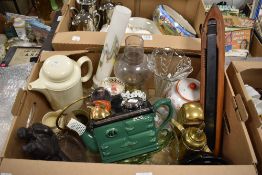 A box of assorted items including an Aga style green teapot, a brass savings bank Royal Mail Box,