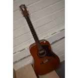 A vintage Eko jumbo acoustic guitar with pickup