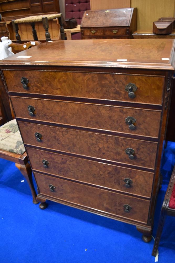 A mid 20th Century walnut bedroom chest of five drawers