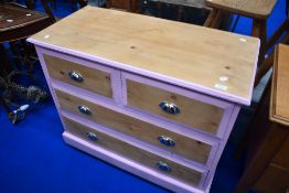 A stripped and part painted chest of two over two drawers, with chrome handles