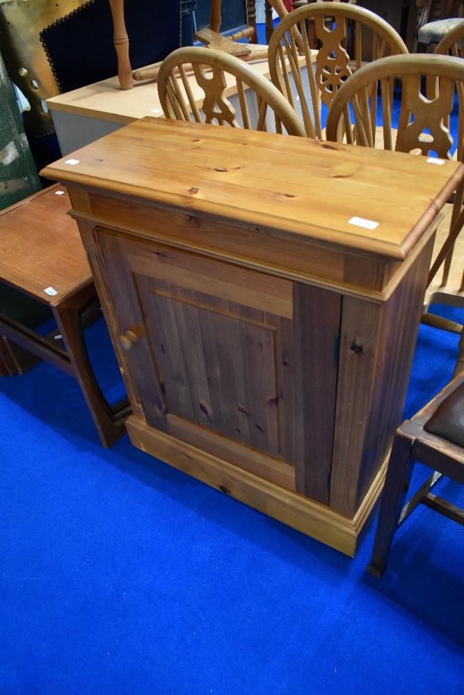 A modern pine shallow cabinet, width approx. 66cm