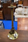 A vintage brass table lamp having octagonal base