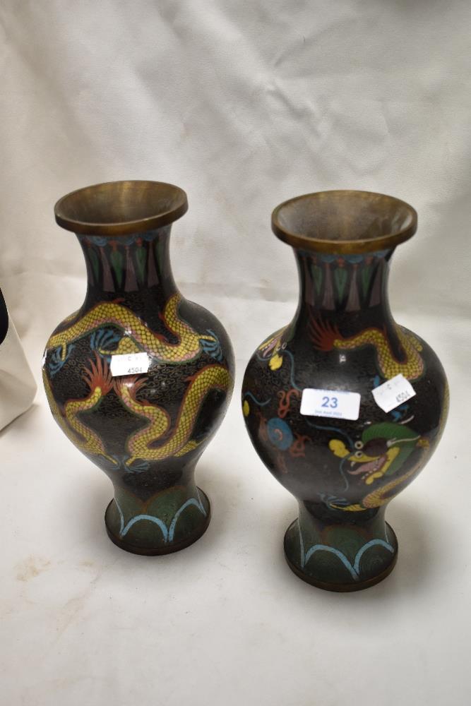 A pair of early 20th century Chinese cloisonne vase of baluster form decorated with traditional